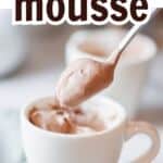 coffee mousse in white cup with spoonful of mousse hovering above.