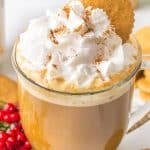 gingerbread coffee drink topped with cream and text gingerbread latte.