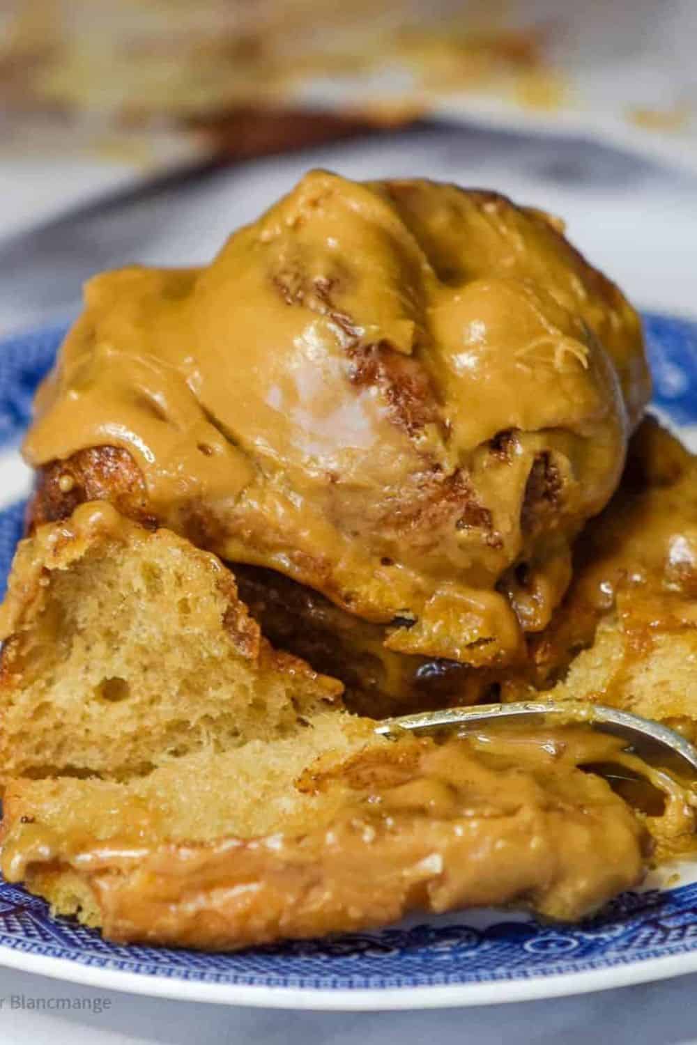 coffee cinnamon rolls on plate.