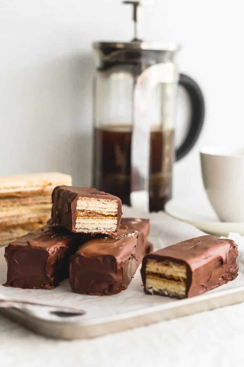 homemade coffee crisp bars stacked on tray.