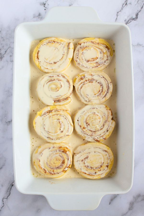 canned cinnamon rolls in dish ready for baking.