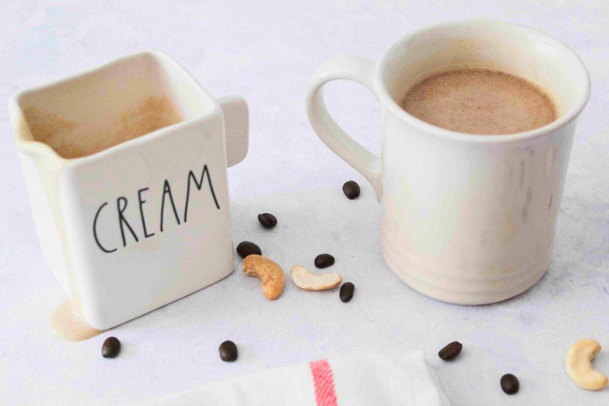 caramel paleo coffee creamer in jug and mug.