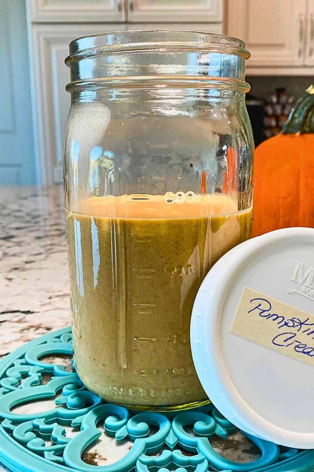 pumpkin vanilla coffee creamer in jar.