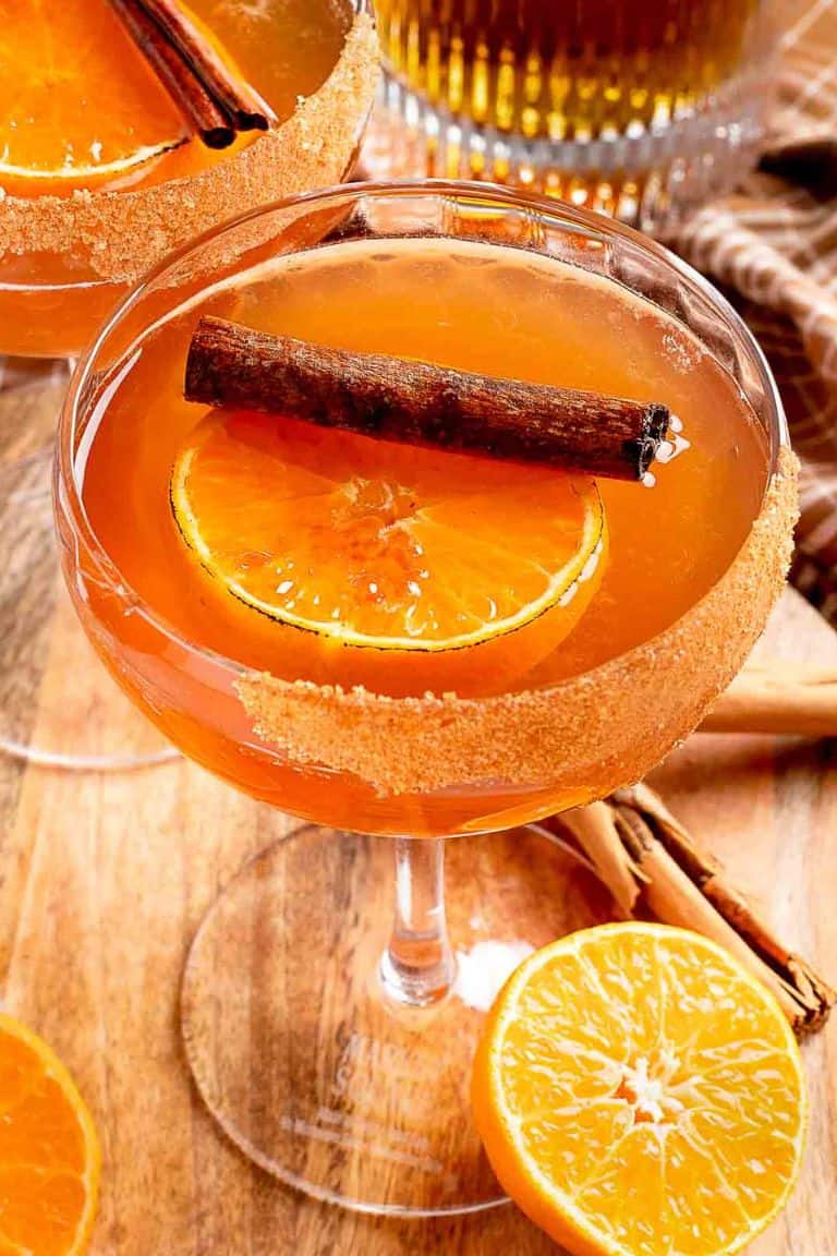 cinnamon old fashioned cocktail in cocktail glass.