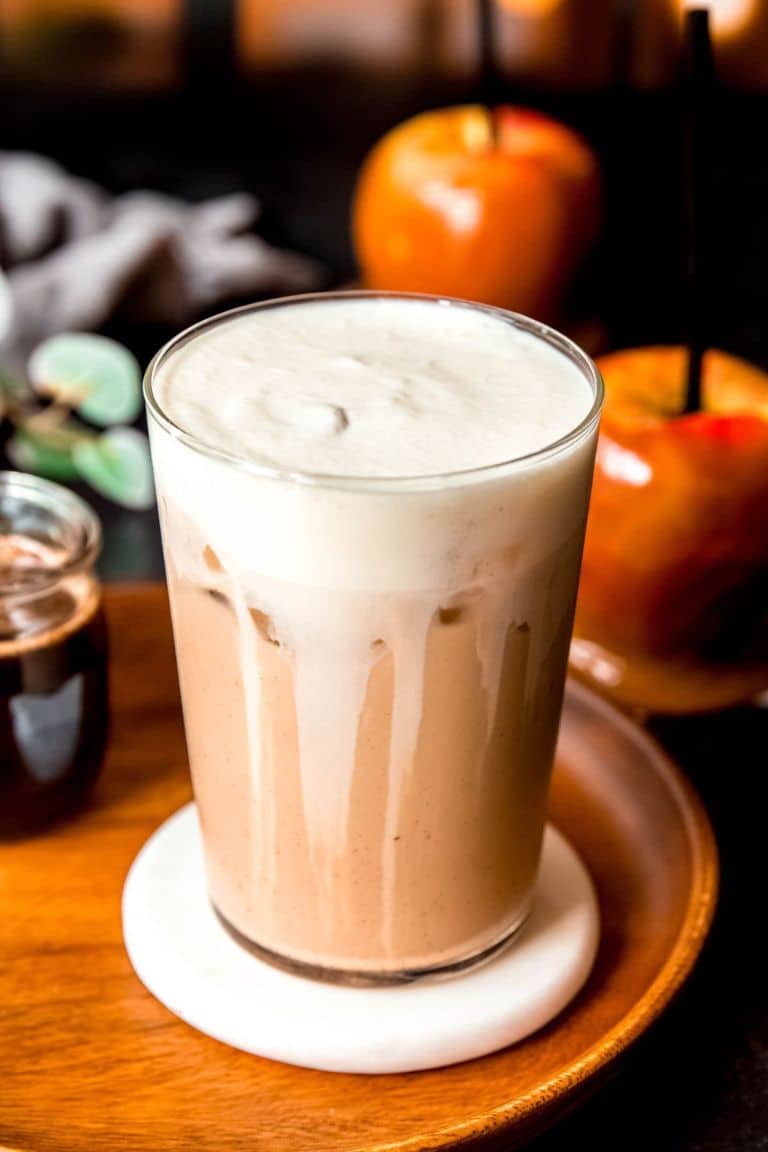 caramel apple cream latte in tall glass.