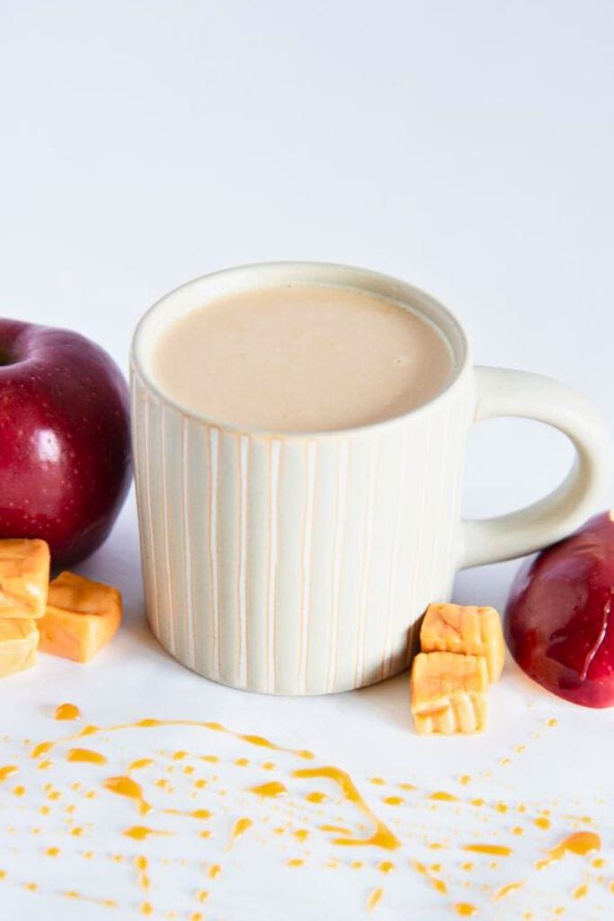 hot caramel apple latte in mug.