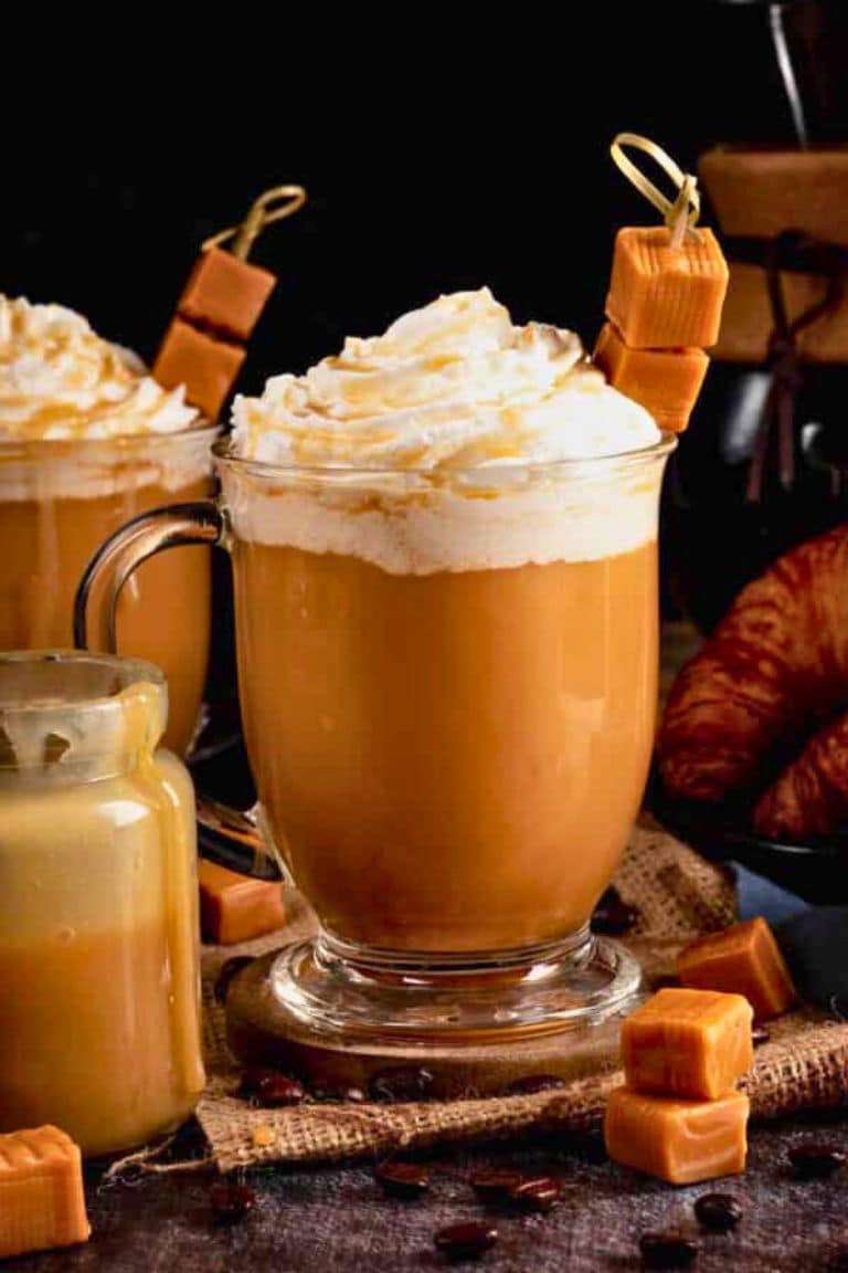 caramel brulee latte with whipped cream and caramels.