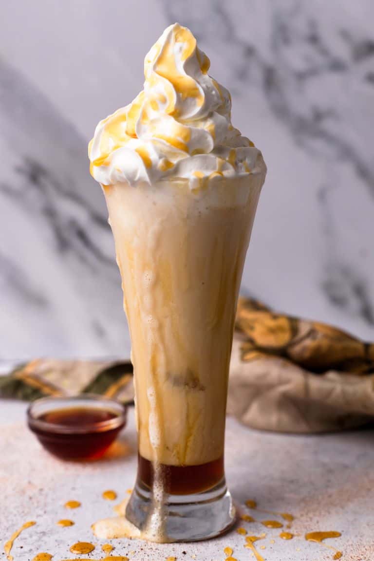 caramel frappuccino in tall glass.