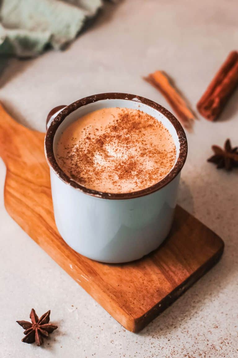 hot pumpkin spice latte in blue mug.
