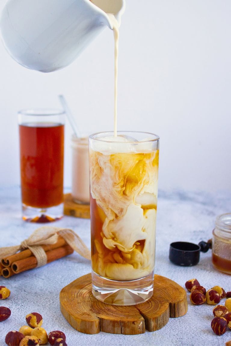 hazelnut iced coffee in tall glass.