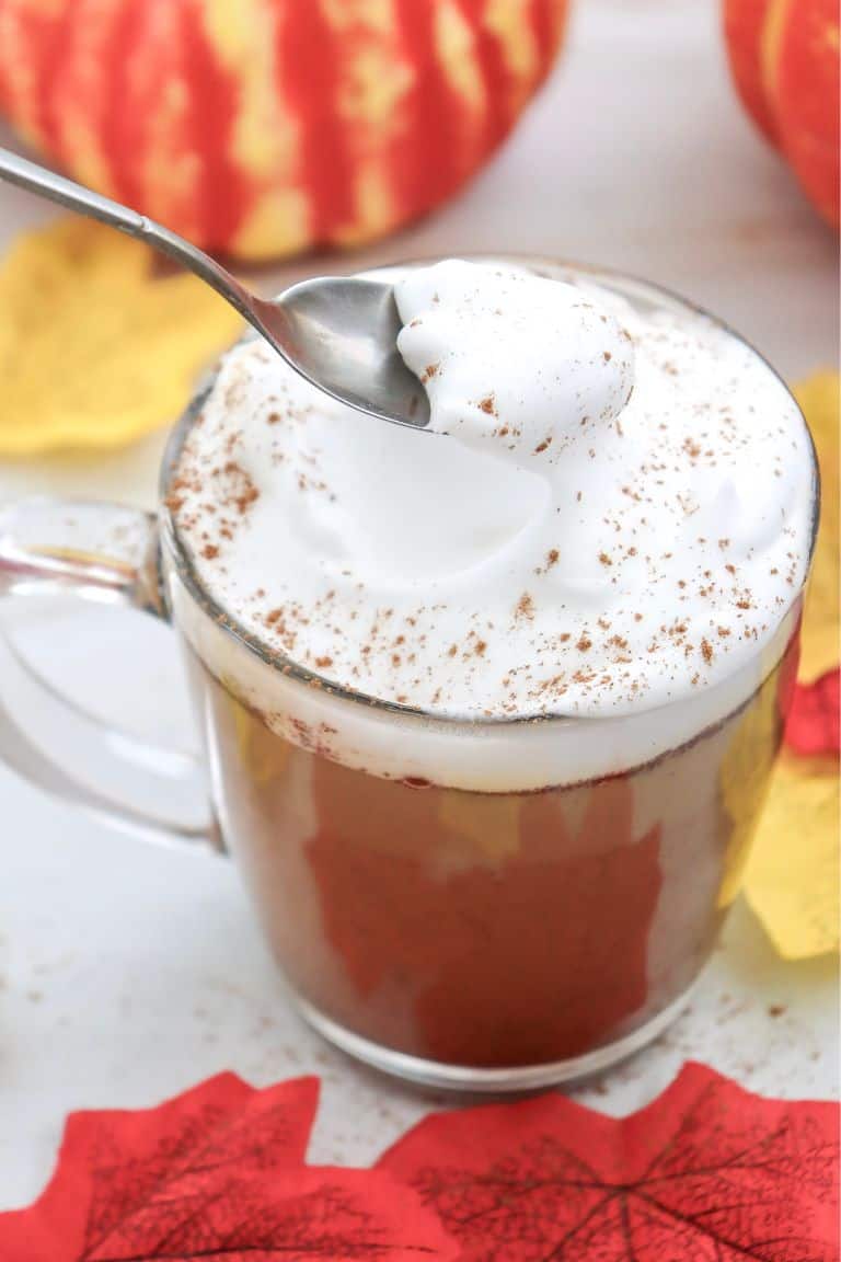 hot pumpkin coffee topped with whipped cream.