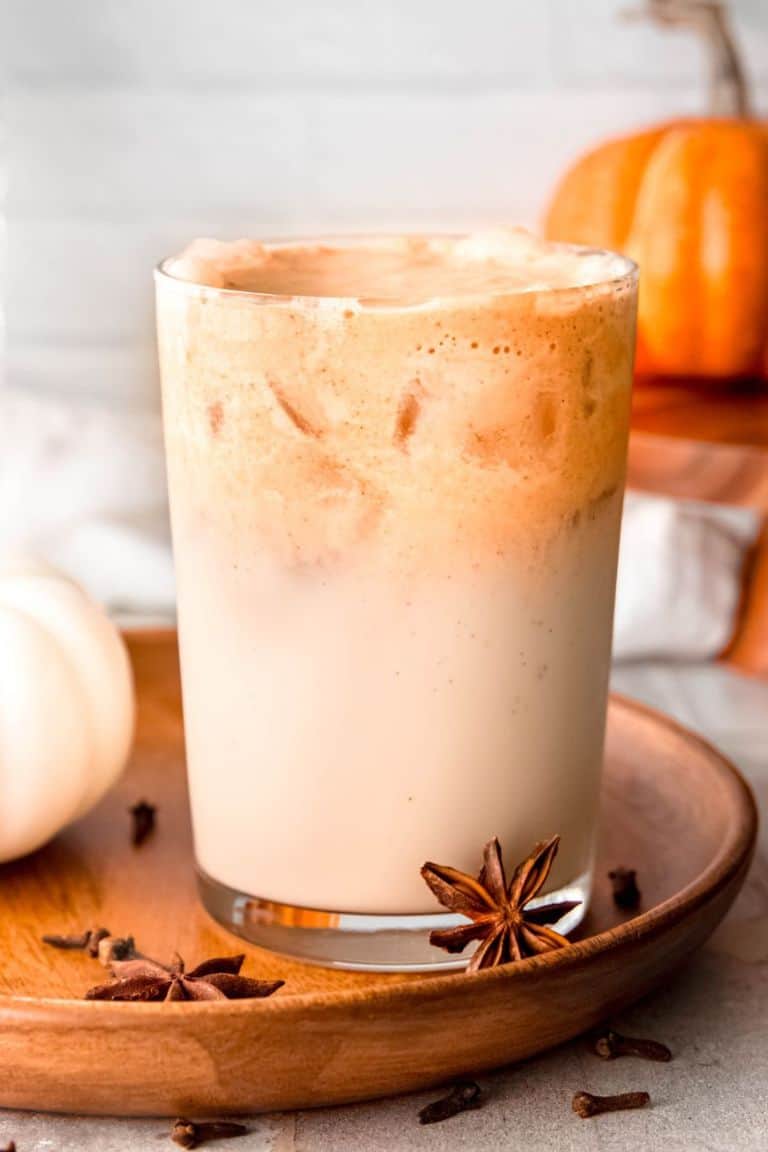 pumpkin cream chai latte in glass.