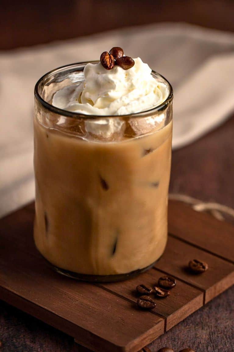 brown cow kahlua dessert cocktail with whipped cream.