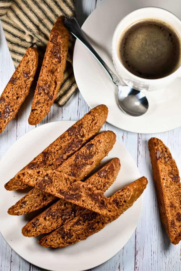 espresso chocolate chip biscotti on white plate.