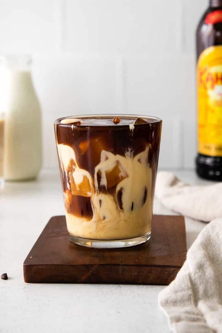 eggnog white russian in short glass.