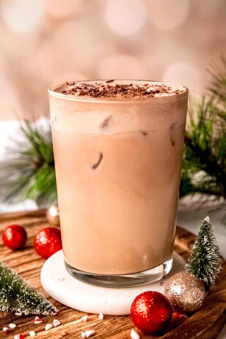 mint white mocha iced coffee with festive christmas decorations.