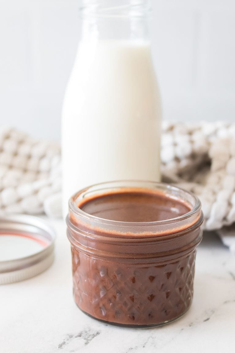 homemade chocolate syrup in jar.