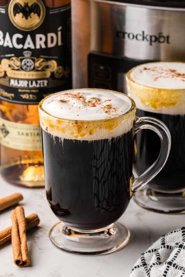 hot spanish coffee drink in glass mug.