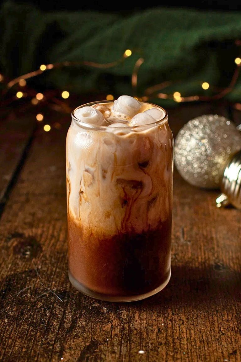 iced peppermint mocha coffee in tall glass.