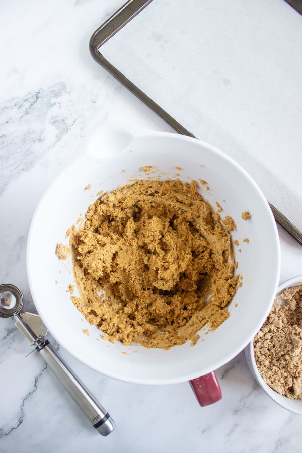 blended pumpkin coffee cake cookie mixture in bowl.