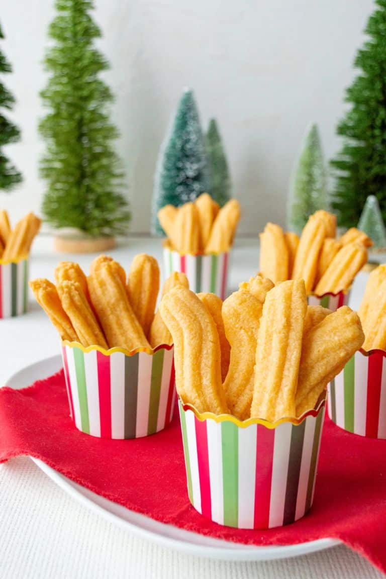 southern cheese straws in paper cups.