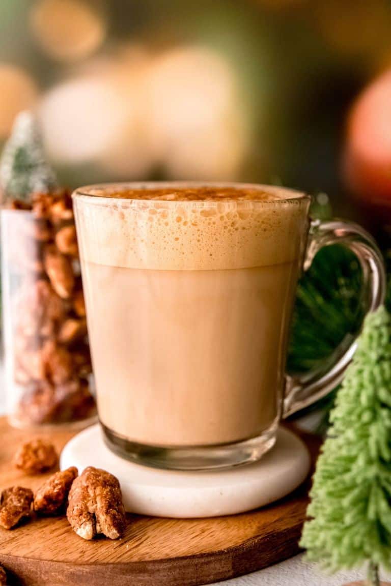 hot chestnut praline latte in glass mug.