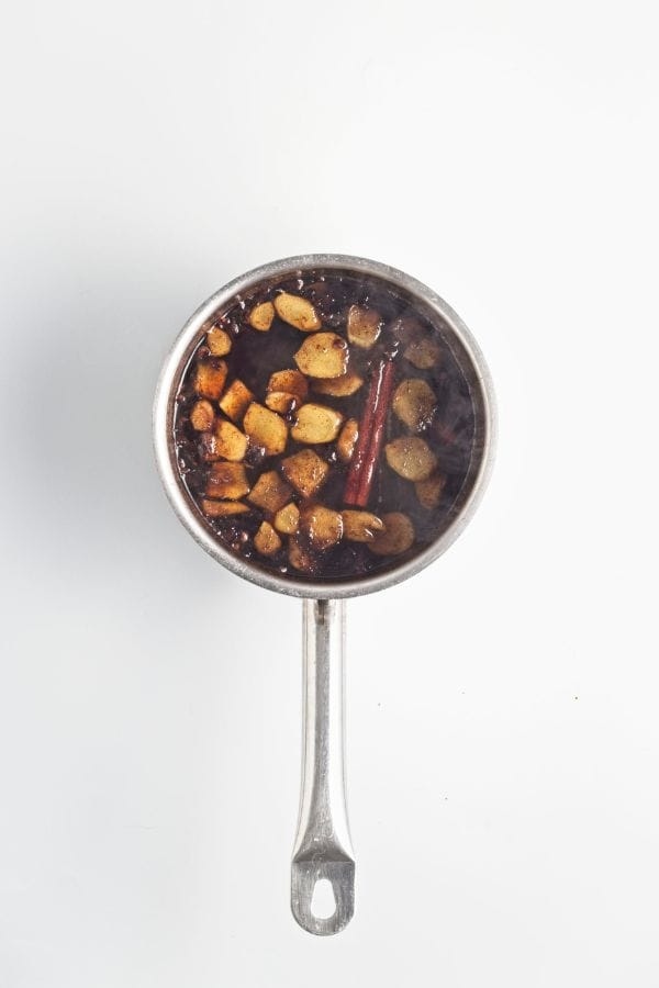 gingerbread drinks syrup ingredients infusing in saucepan.