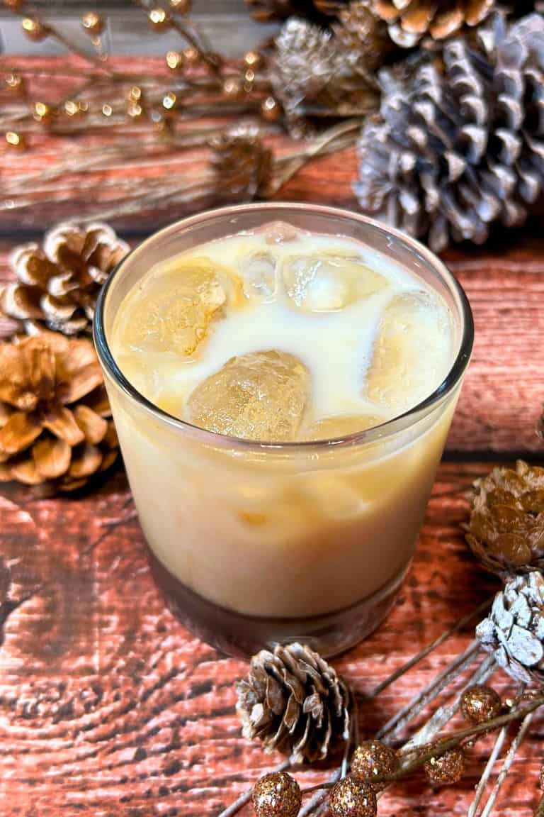 gingerbread white russian with ice in glass.