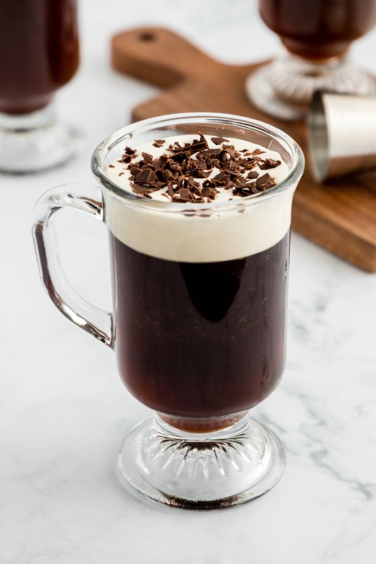 hot irish coffee in glass mug.