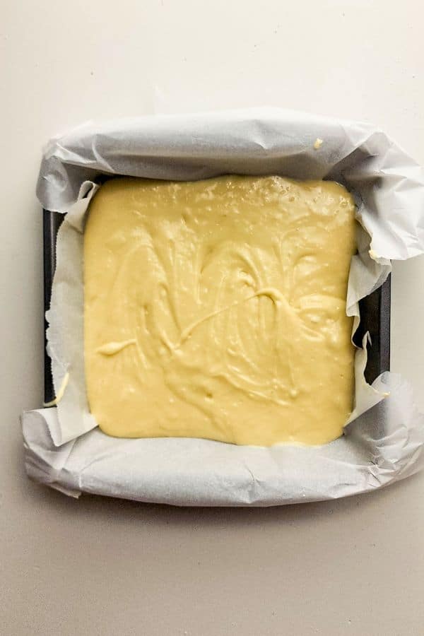 coffee cake batter in lined pan.