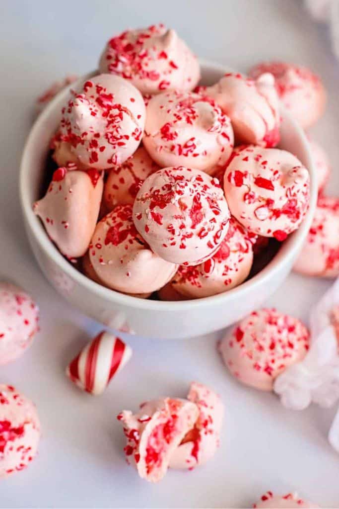 peppermint meringue cookies in bowl.