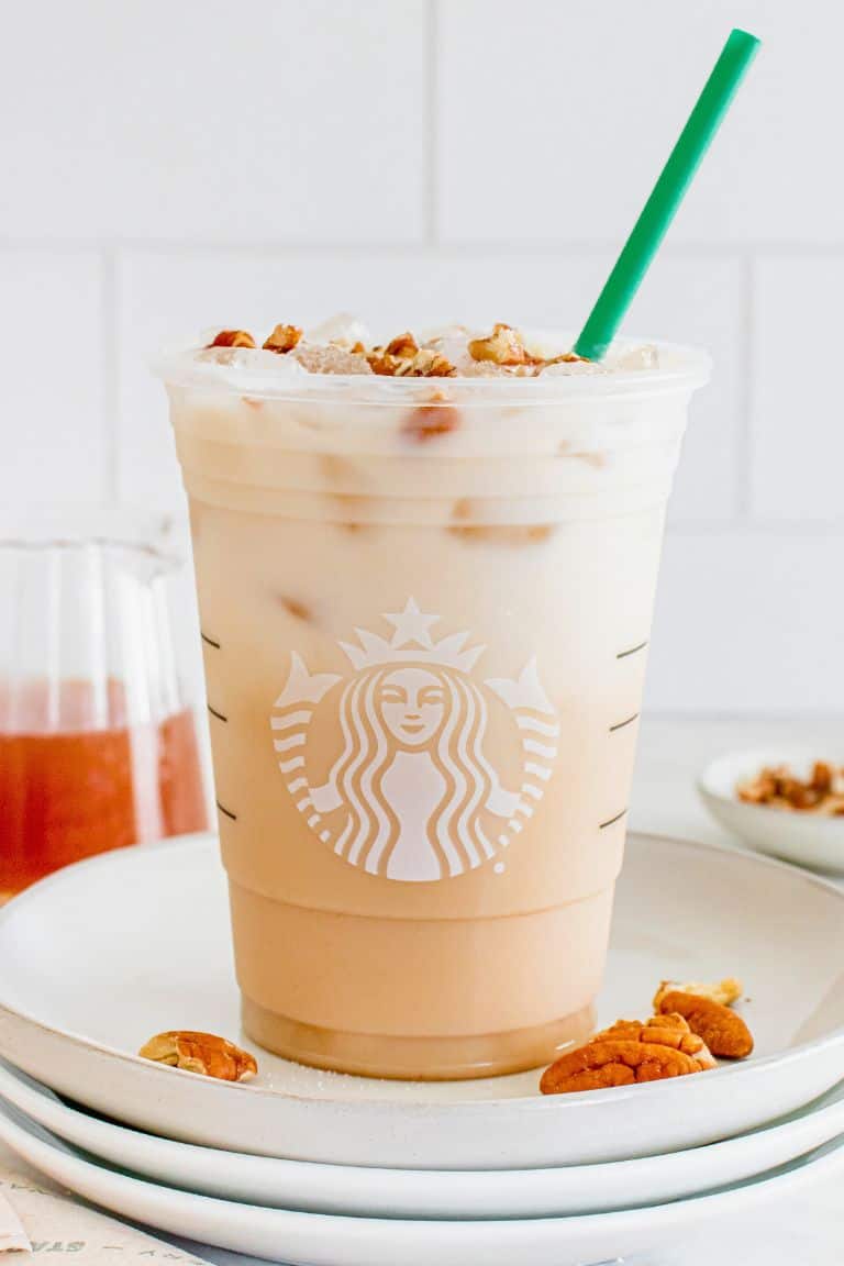 iced pecan latte in starbucks cup.
