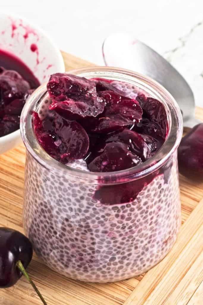 cherry chia pudding in a jar.