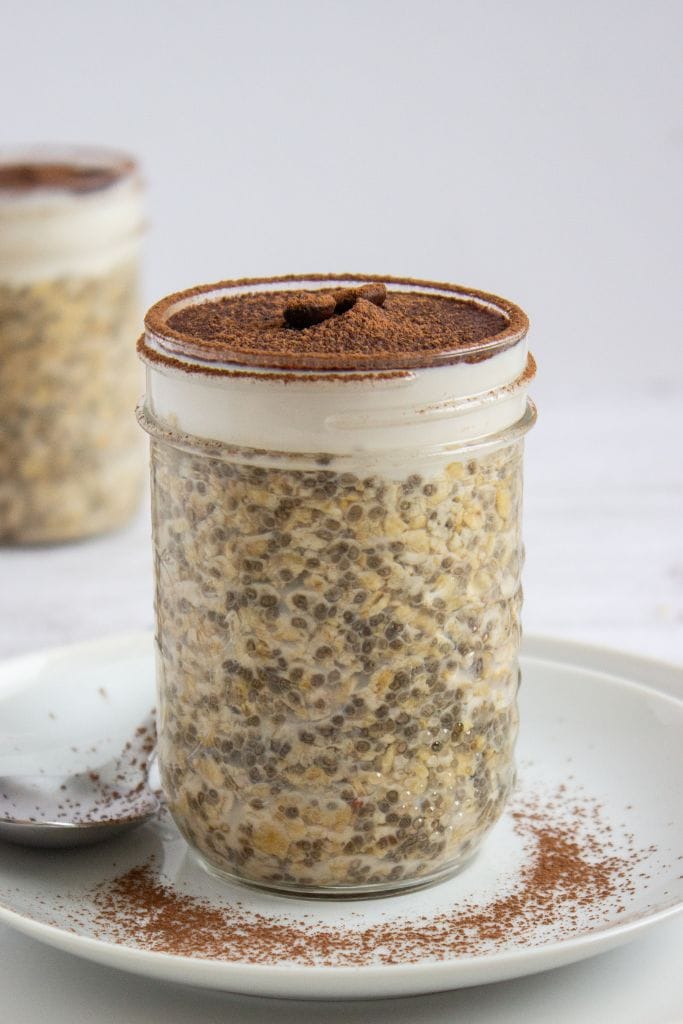 tiramisu overnight oats with chia seeds in a jar.
