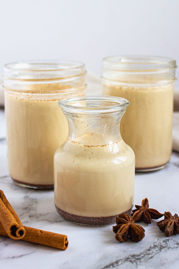 cinnamon roll coffee creamer in jars.