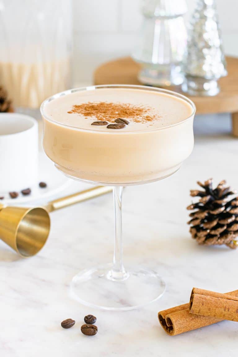 eggnog espresso martini with nutmeg in cocktail glass.