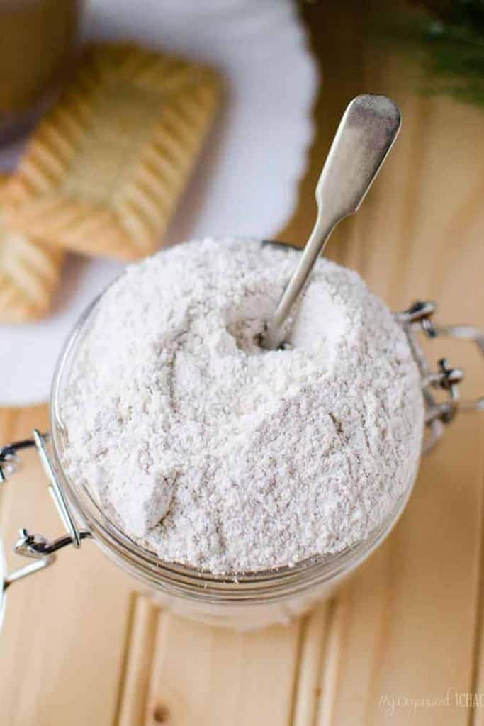 powdered eggnog flavored creamer in jar with spoon.