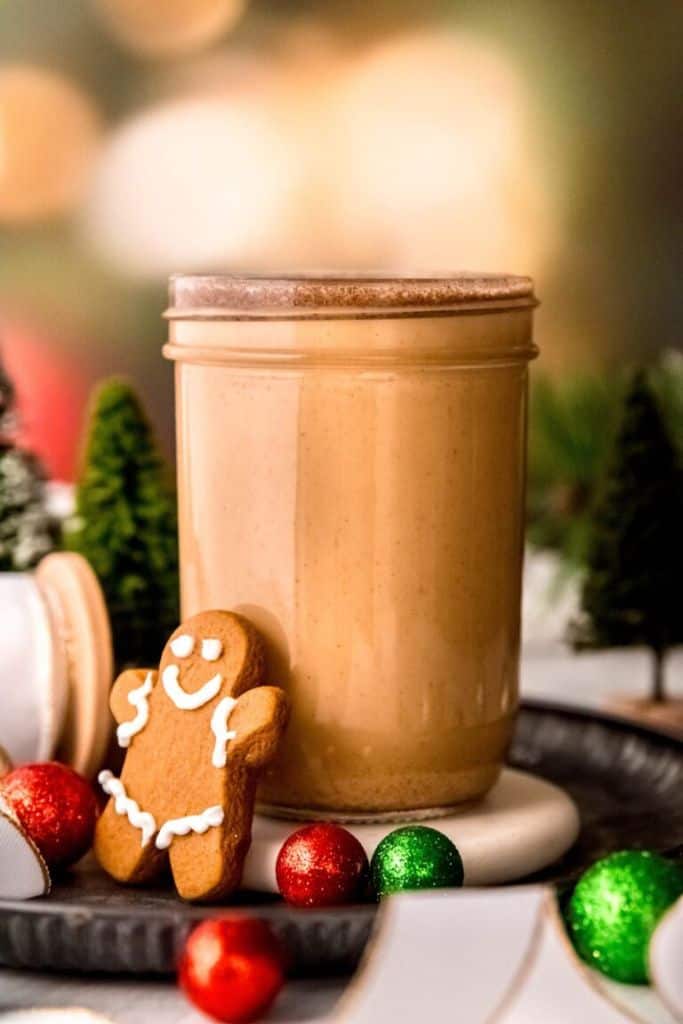 gingerbread coffee creamer in jar with gingerbread man alongside.