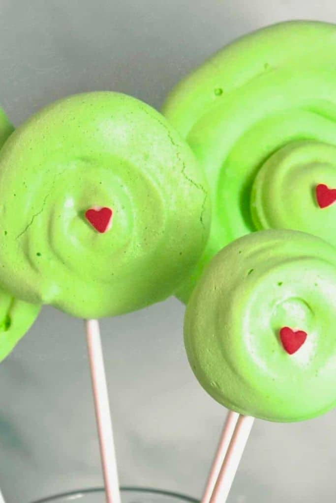 grinch meringue pops on sticks.