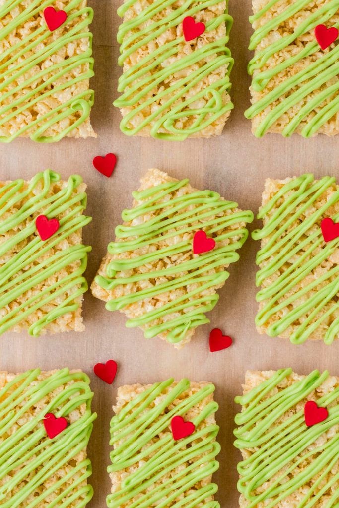 sliced grinch rice krispies on baking paper.