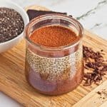 tiramisu chia pudding in jar dusted with cocoa.