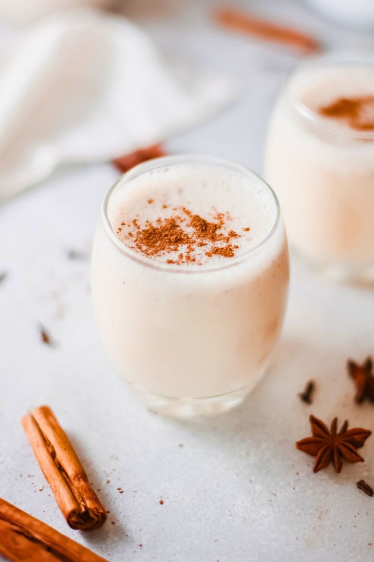 instant pot eggnog in glass with spices.