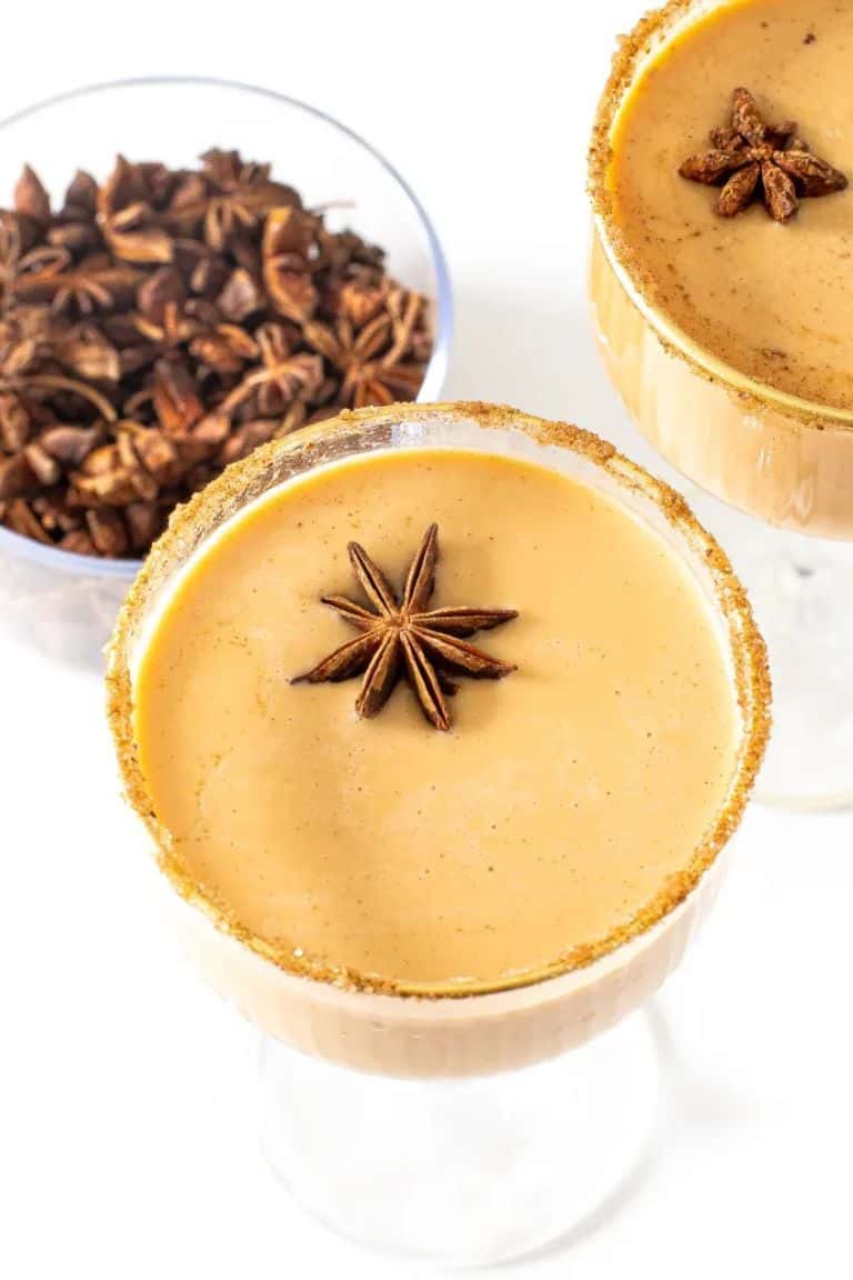 pumpkin spice eggnog cocktail in sugar rimmed cocktail glass.