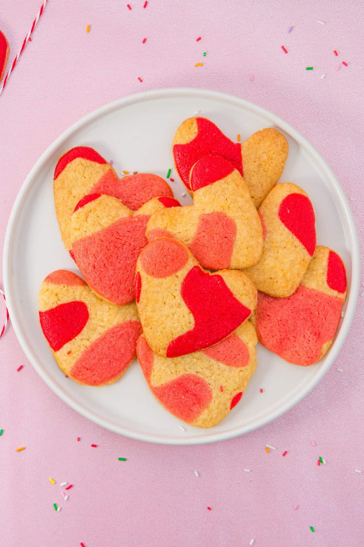 heart shaped cookies on plate.