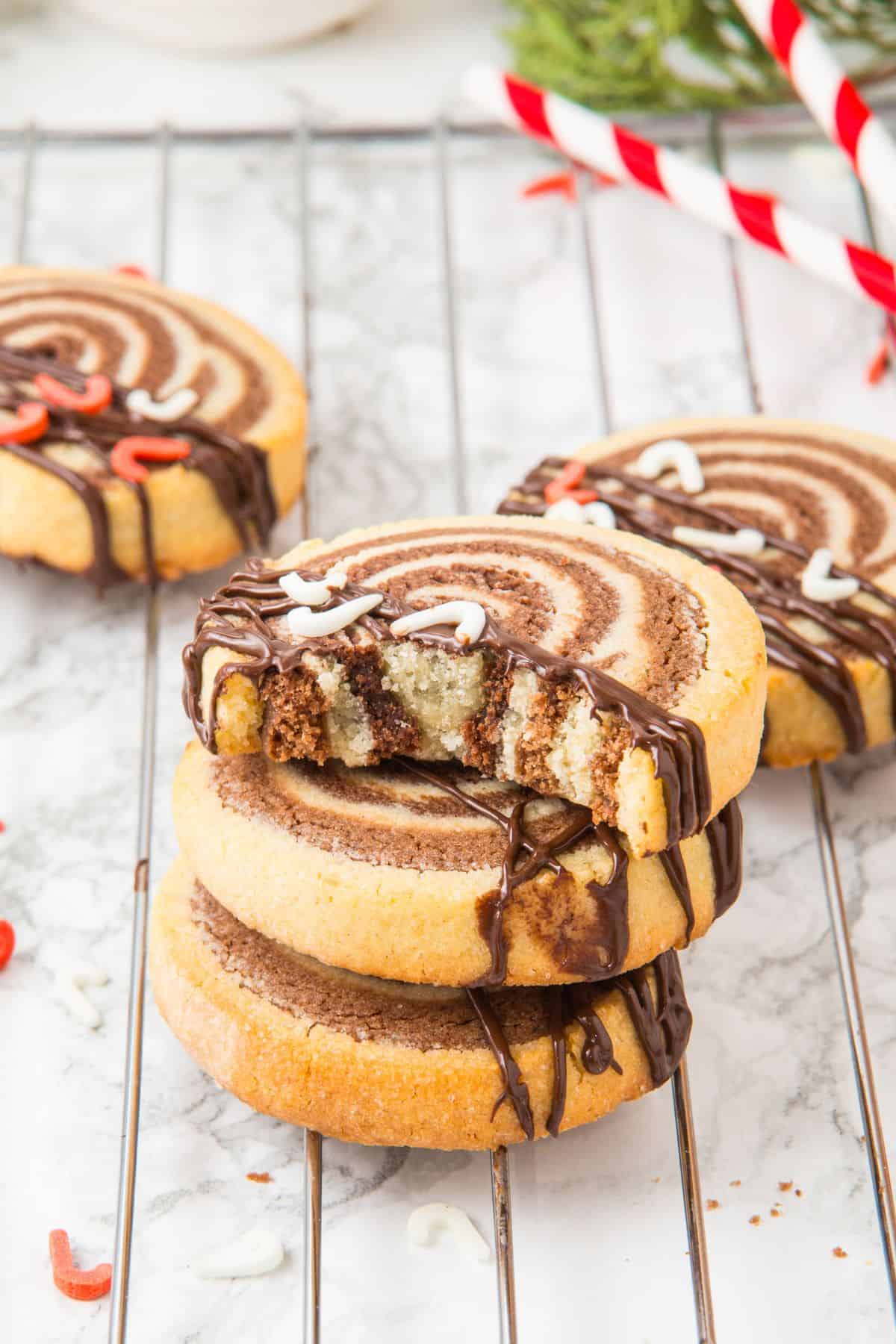 stack of festive swirl pinwheel cookies.