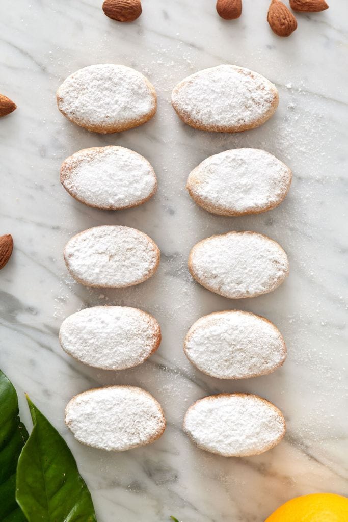 italian cookies arranged on bench.