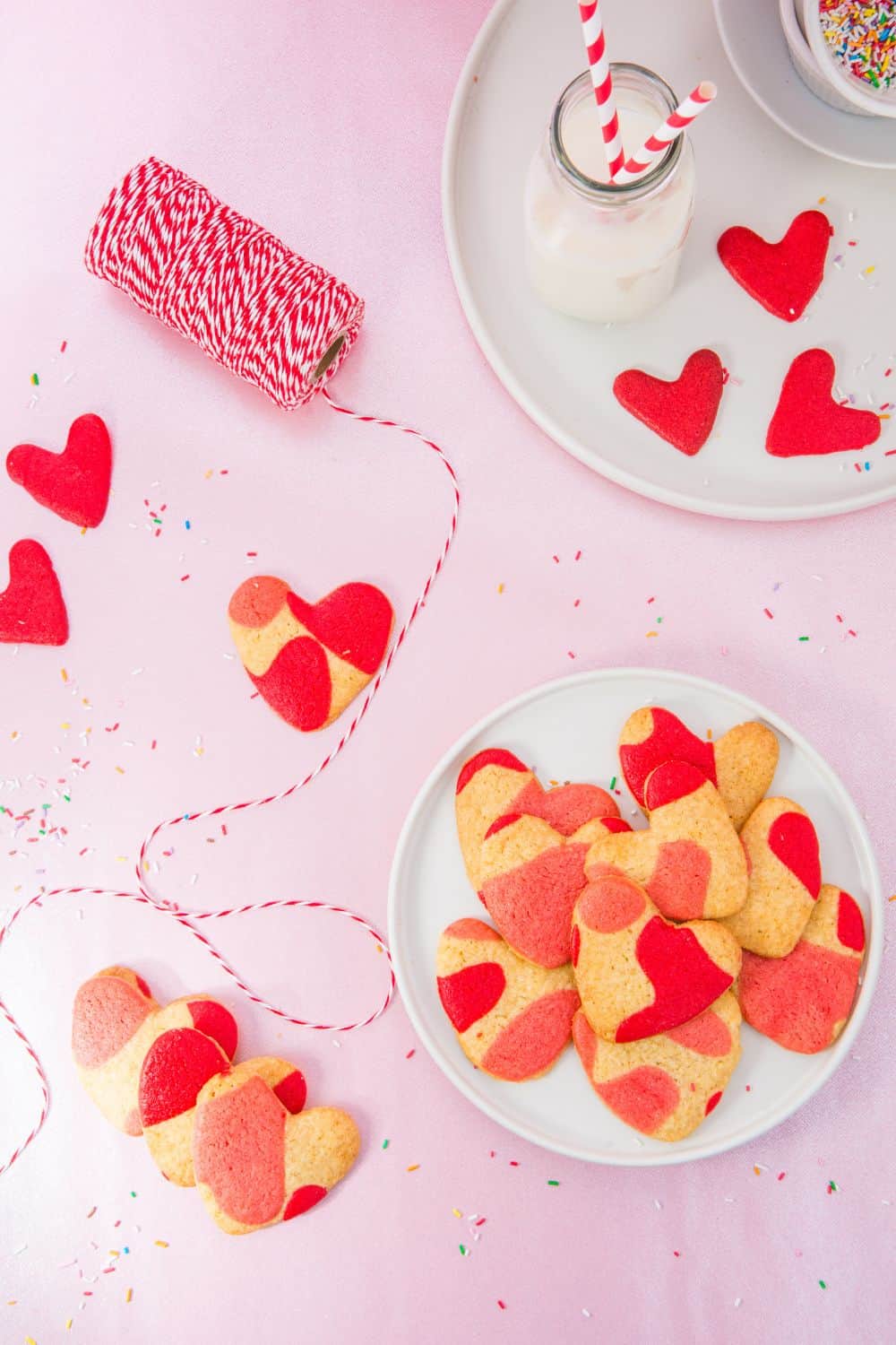 love heart cookies on plate with string and milk bottle.
