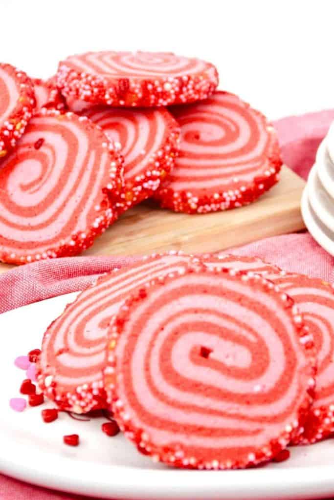pink pinwheel cookies on plate.