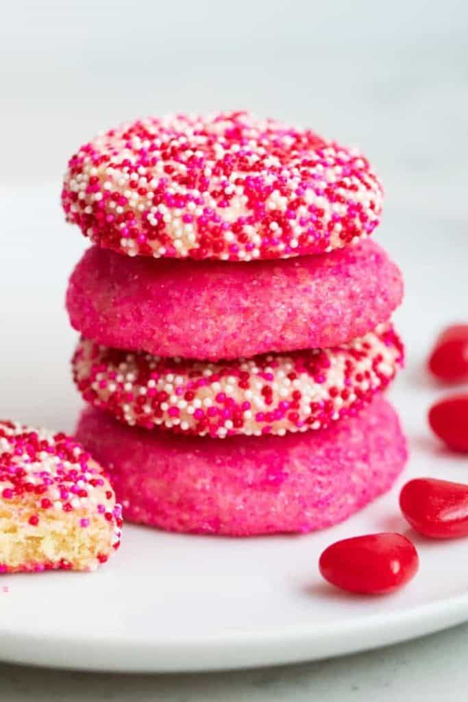 stacked valentine sprinkle sugar cookies.