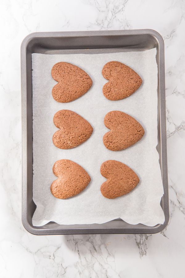 baked sugar cookies on tray.